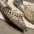 Christian Louboutin Mechante Reine Flats Spike Leather and PVC Silver