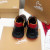 Christian Louboutin Men Runners Calf Leather and Neoprene Pattern Black